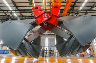 Ship unloader matched with FCG scissor grab